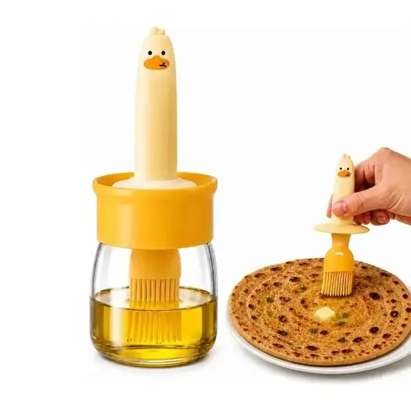 Cute_Duck_Oil_Dispenser_With_Silicone_Brush_Buy_1_Get_1_Free