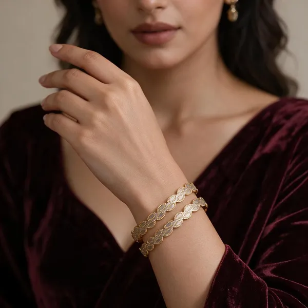 Gold_Alloy_Wavy_Oval_Motif_Textured_Bangle_Set_For_Women