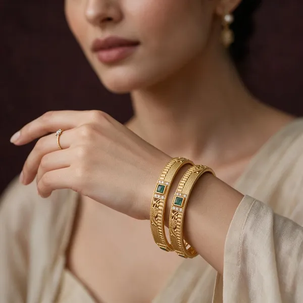Gold_Alloy_Green_Stone_Embellished_Bangle_Set_For_Women