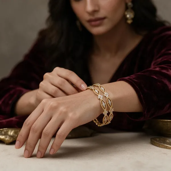 Gold_Alloy_Floral_Link_Articulated_Bangle_Set_For_Women