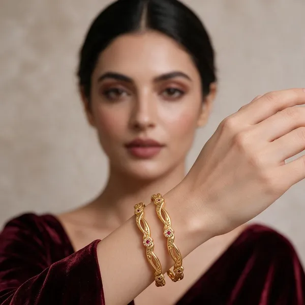 Gold_Alloy_Intertwined_Red_Stone_Embellished_Bangle_Set_For_Women