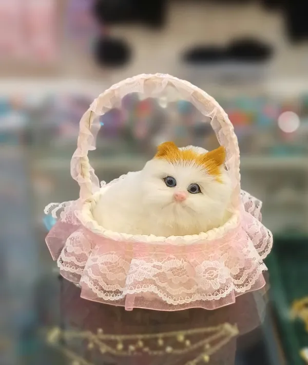 White_Cat_Figurine_In_Pink_Lace_Basket