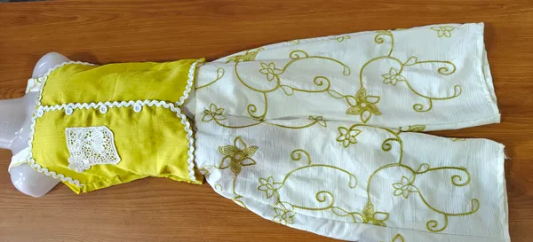 Yellow_Satin_Textured_Sleeveless_Top_And_Palazzo_Set_For_Girls