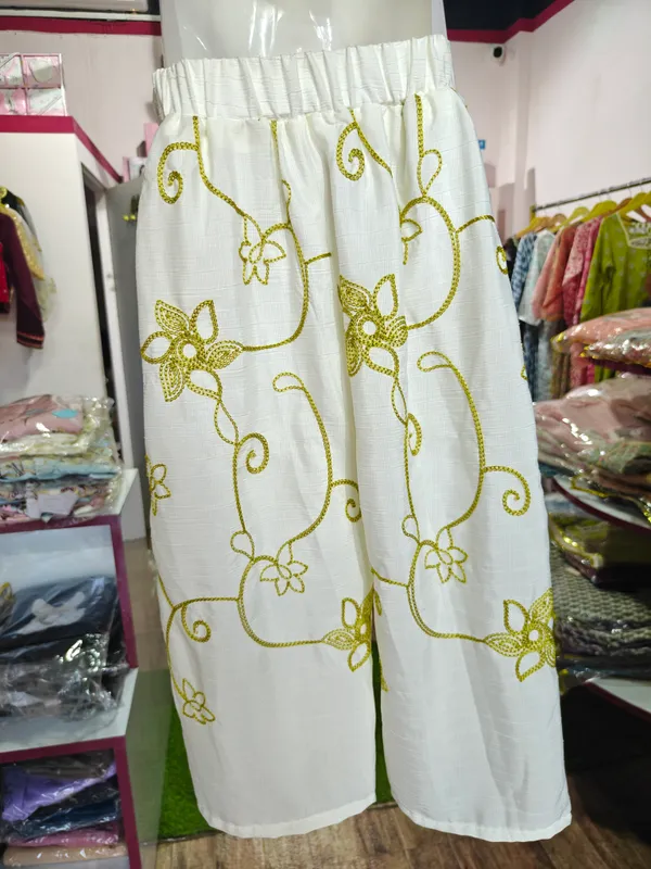 Yellow_Satin_Textured_Sleeveless_Top_And_Palazzo_Set_For_Girls