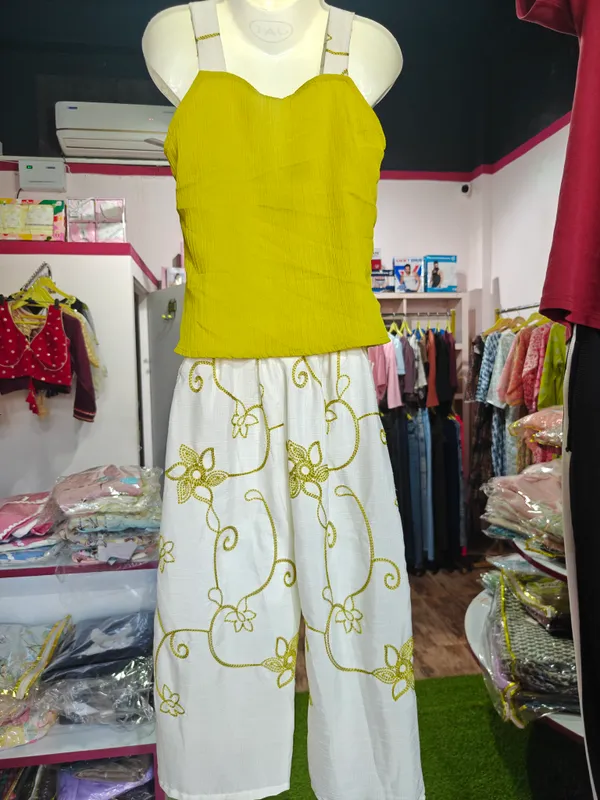 Yellow_Satin_Textured_Sleeveless_Top_And_Palazzo_Set_For_Girls