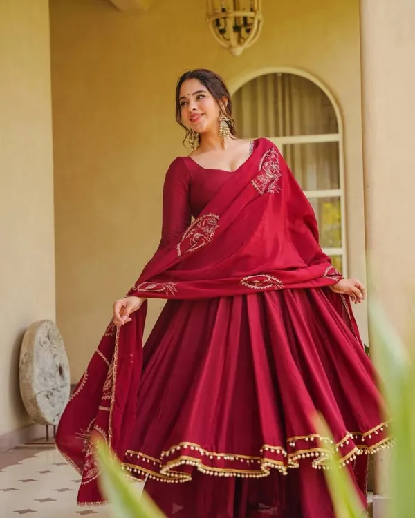 Maroon_Roman_Silk_Flared_Anarkali_Suit_With_Potli_Latkan