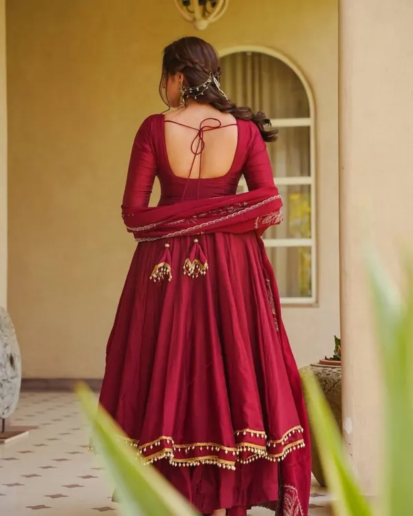 Maroon_Roman_Silk_Flared_Anarkali_Suit_With_Potli_Latkan