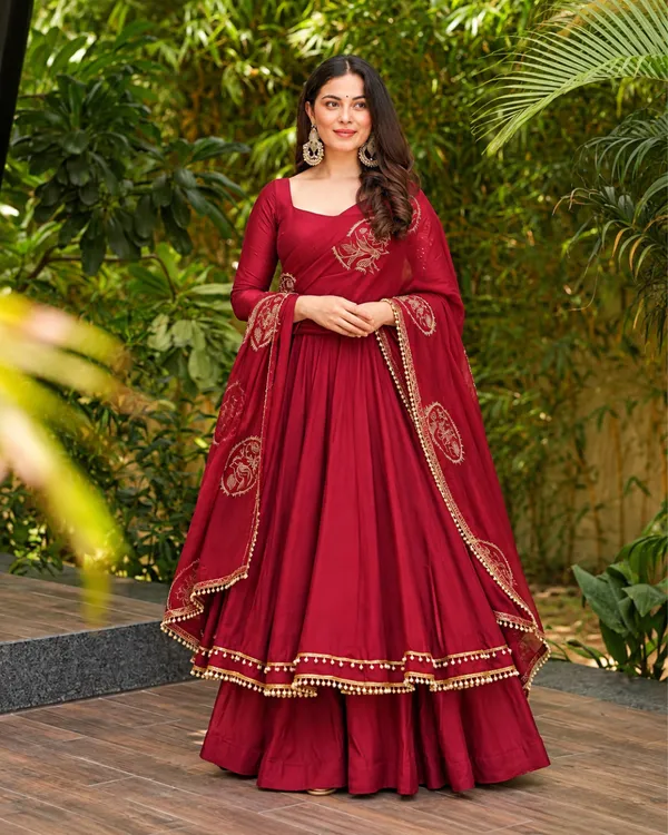 Maroon_Roman_Silk_Flared_Anarkali_Suit_With_Potli_Latkan