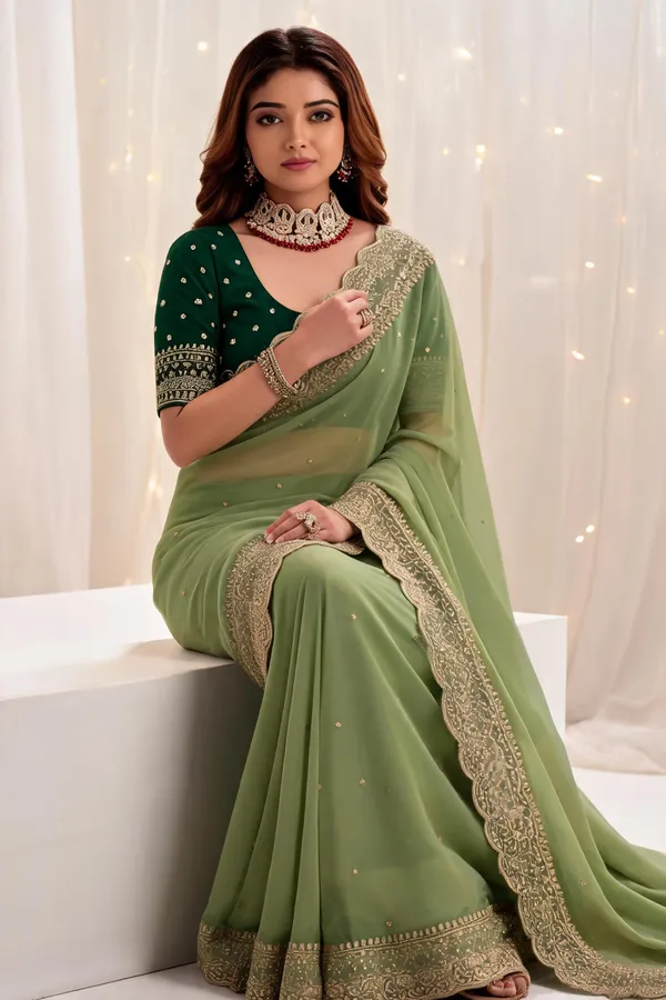 Green_Embroidered_Georgette_Saree_with_Contrast_Embroidered_Blouse