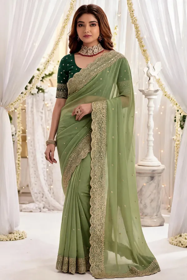 Green_Embroidered_Georgette_Saree_with_Contrast_Embroidered_Blouse