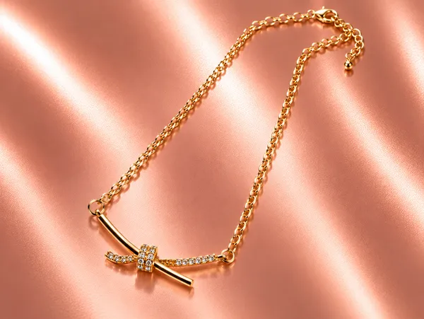Rivsam_Golden_Crystal_Knot_Pendant_Necklace