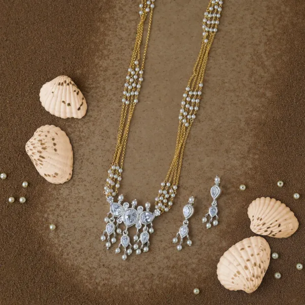Copper_Base_With_Gold_Plated_Swarn_Chandrika_Rice_Pearl_Tanmani