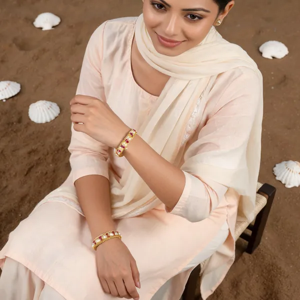 Copper_Base_With_Gold_Plated_Saraswati_Moti_Bangles