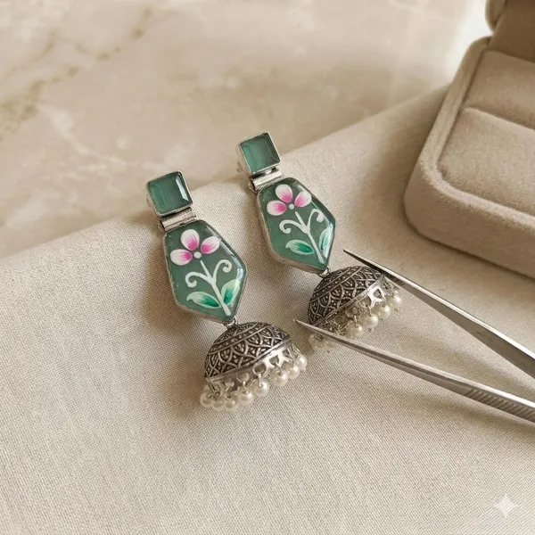 Oxidised_Silver_Jhumka_Earrings_With_Green_Meenakari_Floral_Design_And_Pearl_Drops