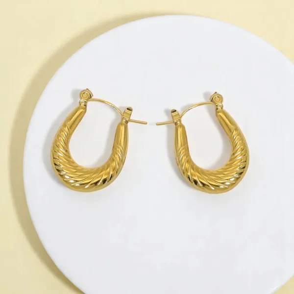 Twist_Muse_Gold_Twisted_U_Hoop_Earrings_Default_Title