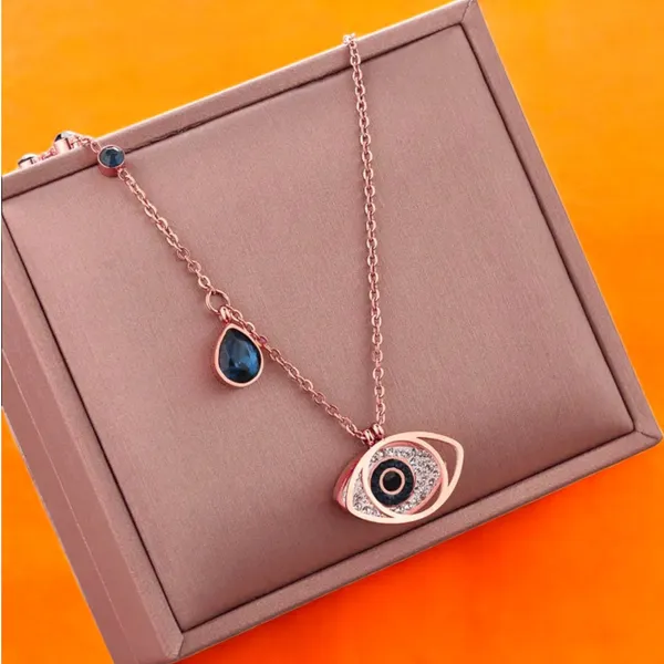 Midnight_Grace_Rose_Gold_Evil_Eye_Necklace_With_Sapphire_Accent_Default_Title