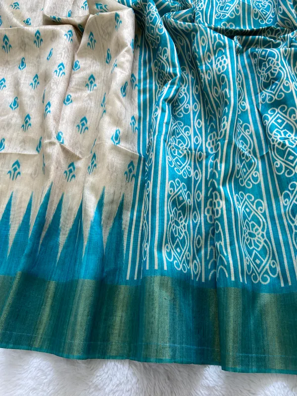 Soft_Tussar_Silk_sarees_with_Beautiful_Print_With_Attractive_Border_And_Contrast_Print_Blouse_With_Tassels