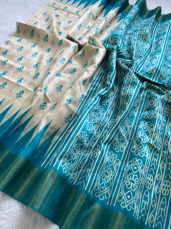 Soft_Tussar_Silk_sarees_with_Beautiful_Print_With_Attractive_Border_And_Contrast_Print_Blouse_With_Tassels