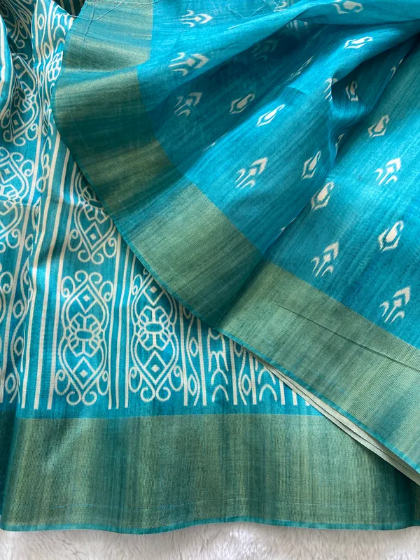 Soft_Tussar_Silk_sarees_with_Beautiful_Print_With_Attractive_Border_And_Contrast_Print_Blouse_With_Tassels