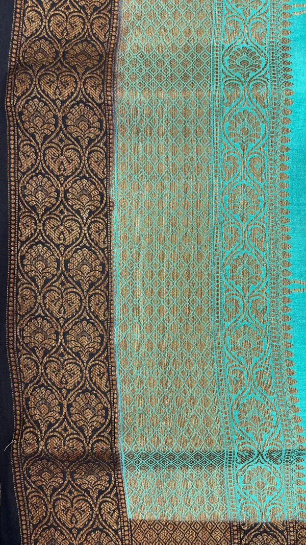 Humairah_Pure_Handwoven_Sea_Green_Muga_Silk_Floral_Zari_Mina_Booti_Contrast_Navy_Blue_Anchal_Copper_Zari_Border_Banarasi_Saree_with_Navy_Blue_Blouse_piece