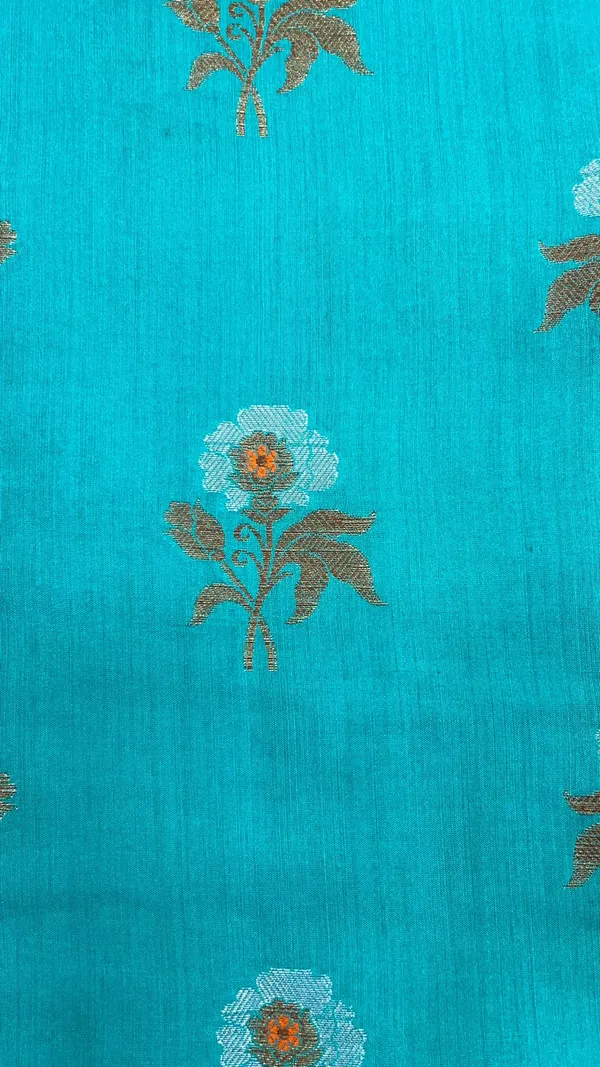 Humairah_Pure_Handwoven_Sea_Green_Muga_Silk_Floral_Zari_Mina_Booti_Contrast_Navy_Blue_Anchal_Copper_Zari_Border_Banarasi_Saree_with_Navy_Blue_Blouse_piece