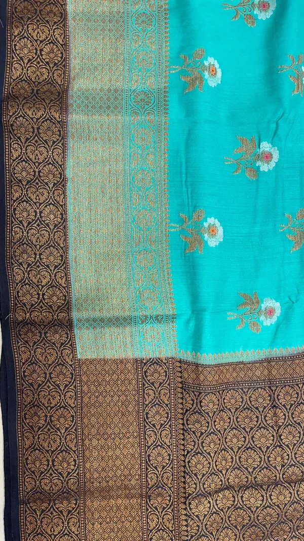 Humairah_Pure_Handwoven_Sea_Green_Muga_Silk_Floral_Zari_Mina_Booti_Contrast_Navy_Blue_Anchal_Copper_Zari_Border_Banarasi_Saree_with_Navy_Blue_Blouse_piece