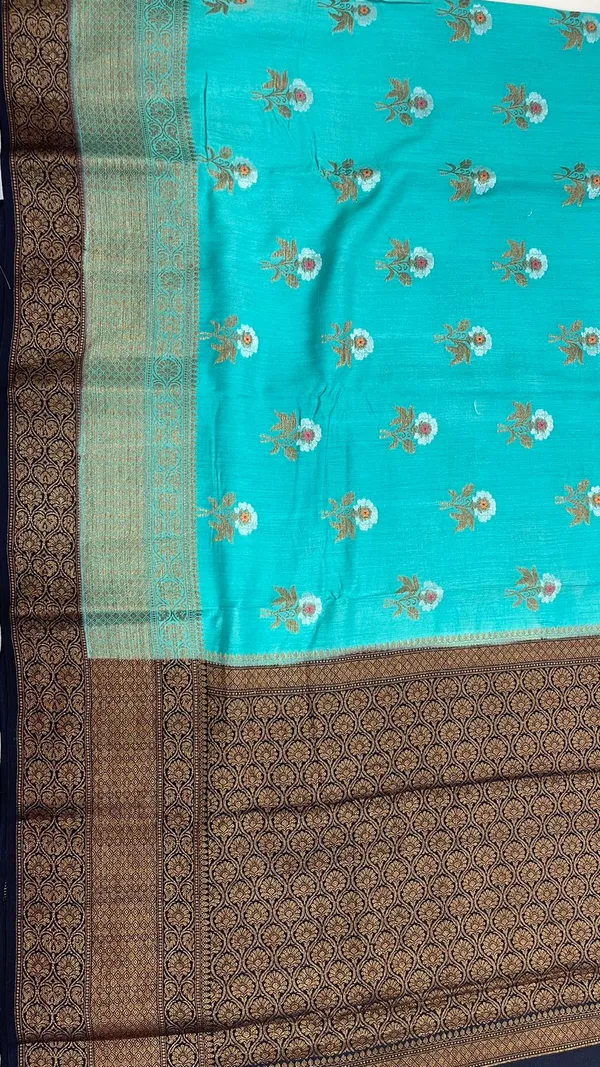 Humairah_Pure_Handwoven_Sea_Green_Muga_Silk_Floral_Zari_Mina_Booti_Contrast_Navy_Blue_Anchal_Copper_Zari_Border_Banarasi_Saree_with_Navy_Blue_Blouse_piece