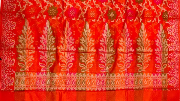 Humairah_Presents_Orange_Semi_Georgette_Alfi_Mina_Floral_Zari_Jaal_Minakari_Zari_Border_with_Banarasi_Floral_Boota_Pallu_and_Red_Multi_Stripe_Blouse