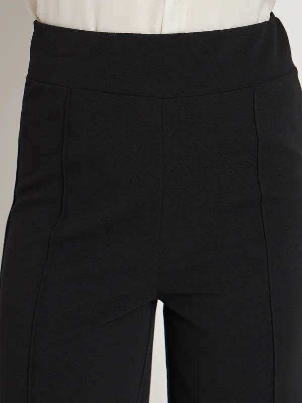 Black_Polyester_Self_Design_Relaxed_Fit_Palazzos_For_Women