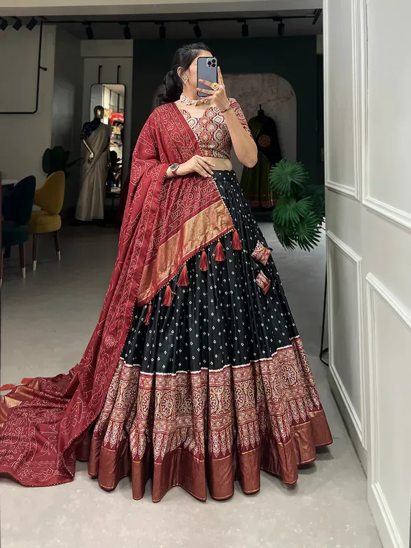 https://d1311wbk6unapo.cloudfront.net/NushopCatalogue/tr:f-webp,w-600,fo-auto/Art_Women_s_Tussar_Silk_With_Leheriya_And_Foil_Print_Lehenga_choli_Set_Women_s_Organza_Floral_White_Semi_Stitched_Lehenga_Choli_HLRID4BY5S_2024-07-12_1.jpg__BHMG FASHION