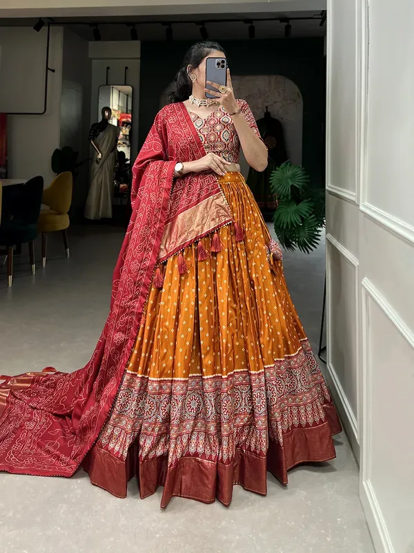 https://d1311wbk6unapo.cloudfront.net/NushopCatalogue/tr:f-webp,w-600,fo-auto/Art_Women_s_Tussar_Silk_With_Leheriya_And_Foil_Print_Lehenga_choli_Set_Women_s_Organza_Floral_White_Semi_Stitched_Lehenga_Choli_VFE9FOFMMG_2024-07-12_1.jpg__BHMG FASHION