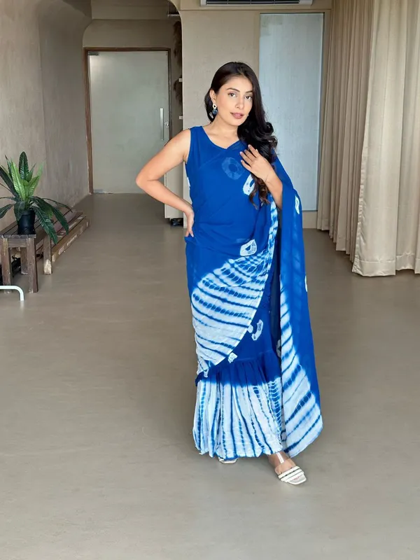 https://d1311wbk6unapo.cloudfront.net/NushopCatalogue/tr:f-webp,w-600,fo-auto/Blue_Tie_Dye_Gown_Saree_M3J9KSV3Z0_2024-07-18_1.jpg