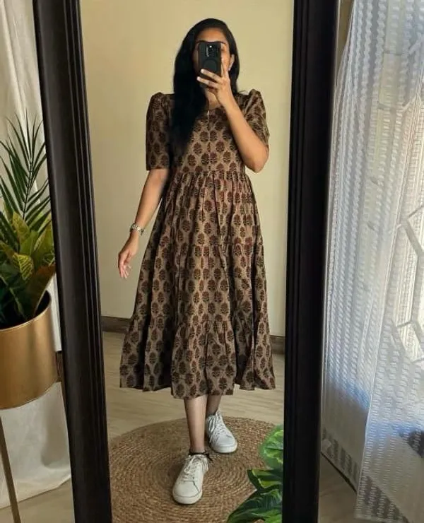 https://d1311wbk6unapo.cloudfront.net/NushopCatalogue/tr:f-webp,w-600,fo-auto/Brown_Color_Floral__Printed_Cotton_Flared_Gown__90AR22F2JW_2024-06-22_3.jpeg__Rajdulari