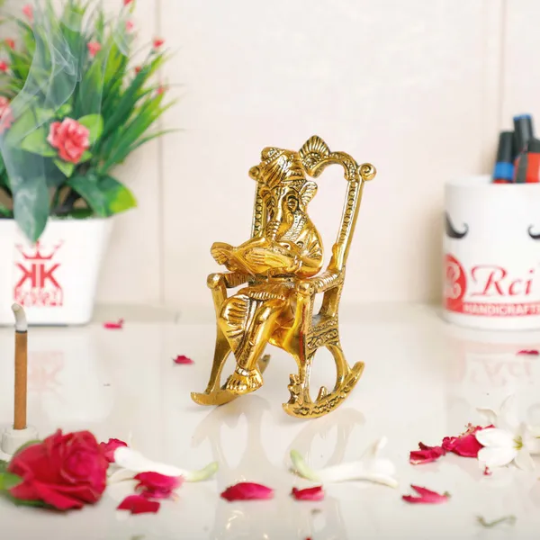 Metal_Ganesha_Sitting_On_Moving_Chair_And_Reading_Ramayan_Metal_Statue_For_Your_Home_Office_Decorative