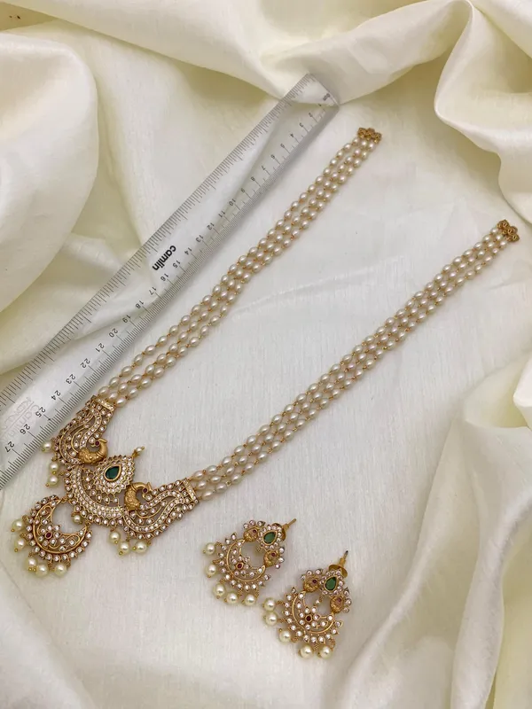 FLAUNT_CLASSIC_THREE_LAYERED_PEARL_LONG_HARAM