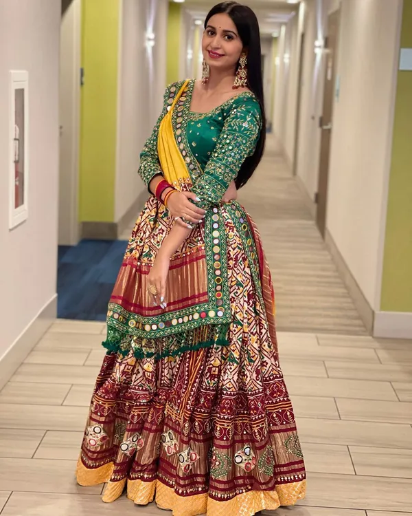 Red_Green_Lehenga_Choli_With_Mirror_Work_And_Attached_Yellow_Dupatta