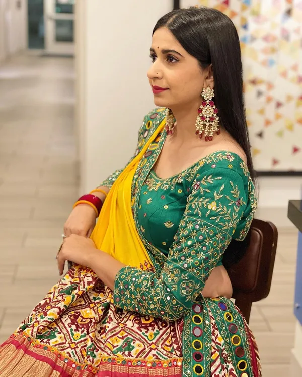 Red_Green_Lehenga_Choli_With_Mirror_Work_And_Attached_Yellow_Dupatta