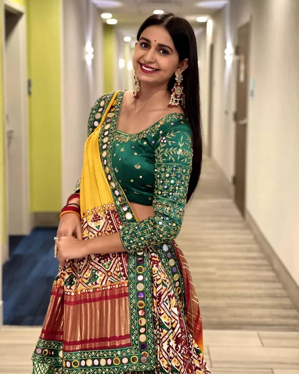 Red_Green_Lehenga_Choli_With_Mirror_Work_And_Attached_Yellow_Dupatta