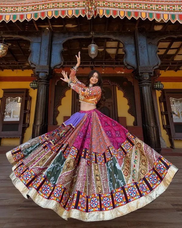 Multi_Mustard_Lehenga_Choli_With_Mirror_Work_And_Attached_Black_Dupatta