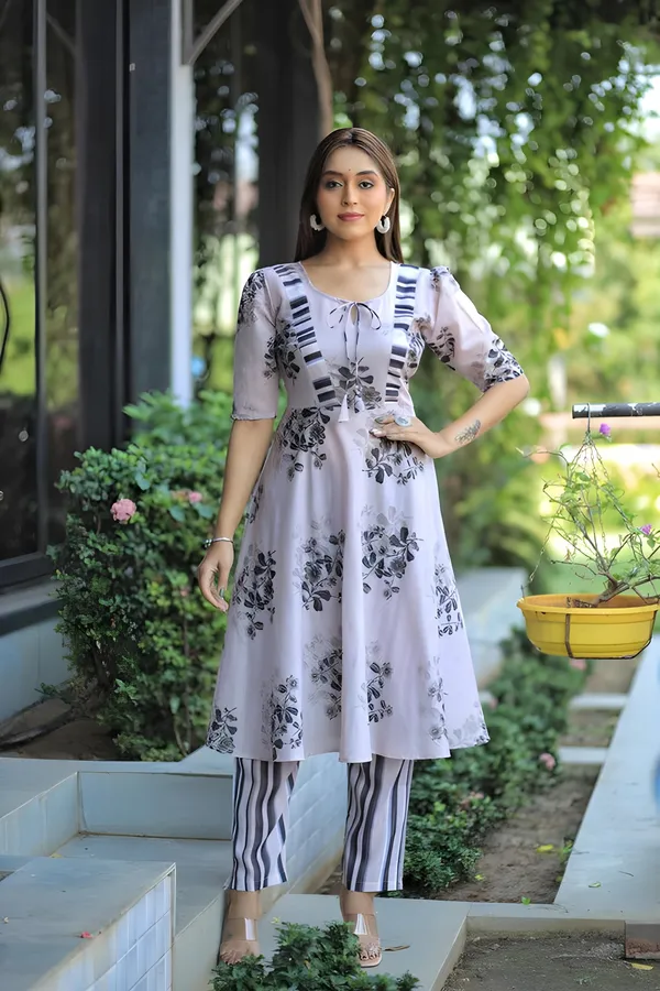 https://d1311wbk6unapo.cloudfront.net/NushopCatalogue/tr:f-webp,w-600,fo-auto/Dassy_Pure_Cotton_Floral_Printed_Kurti_and_pant_4FDFKJLFWO_2024-07-14_1.jpg__Flora Art