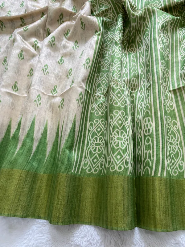 Manjusha_Green_–_Treasured_Navratri_Special_|_Soft_Tussar_Silk_Saree_with_Print,_Border_&_Contrast_Print_Blouse_with_Tassels