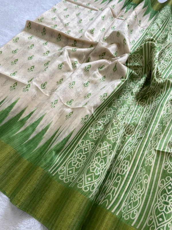 Manjusha_Green_–_Treasured_Navratri_Special_|_Soft_Tussar_Silk_Saree_with_Print,_Border_&_Contrast_Print_Blouse_with_Tassels