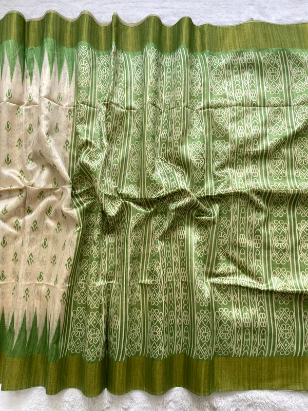 Manjusha_Green_–_Treasured_Navratri_Special_|_Soft_Tussar_Silk_Saree_with_Print,_Border_&_Contrast_Print_Blouse_with_Tassels