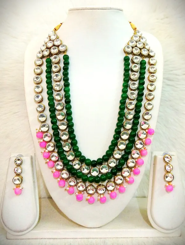 https://d1311wbk6unapo.cloudfront.net/NushopCatalogue/tr:f-webp,w-600,fo-auto/Dhivara_Light_Pink_and__Green_Alloy_Copper_Jewellery_Set_For_Women_WPBF101LAY_2024-07-11_1.jpg__DHIVARA