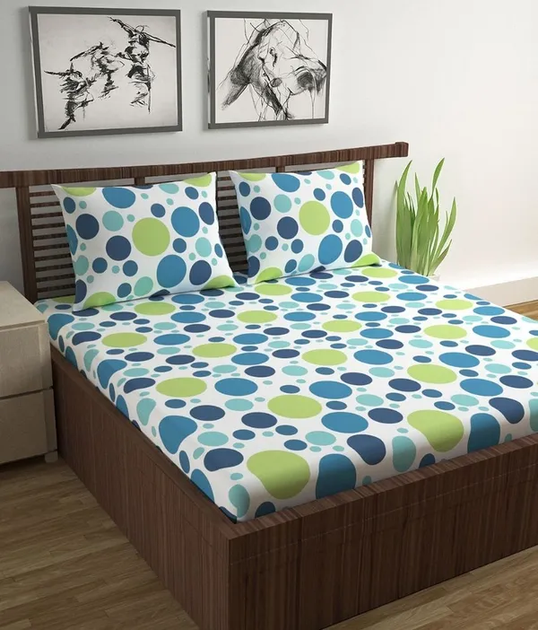 https://d1311wbk6unapo.cloudfront.net/NushopCatalogue/tr:f-webp,w-600,fo-auto/Divine_Casa_100__Cotton_120_TC_Polka_Dot_Bedsheet_for_Double_Bed_with_2_Pillow_Covers_-__222_x_254_cm__Blue_and_Green_Y84QOQJQ2D_2023-03-30_1.jpg__DIVINE CASA