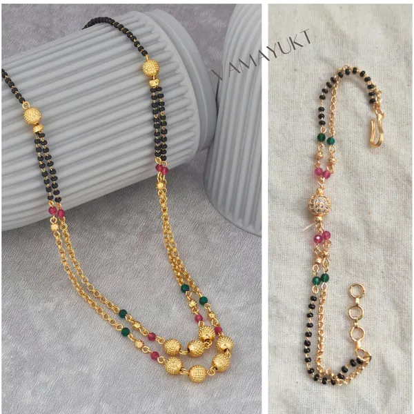 https://d1311wbk6unapo.cloudfront.net/NushopCatalogue/tr:f-webp,w-600,fo-auto/Double_layer_mangalsutra_Bracelate___mangalsutra_ruby_green_6Y2YYCO4LY_2023-04-18_1.png__Vamayukt