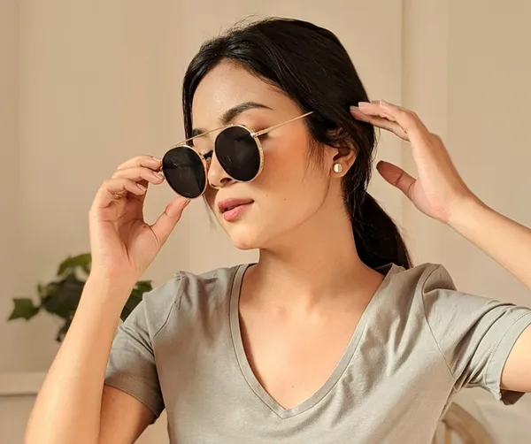 https://d1311wbk6unapo.cloudfront.net/NushopCatalogue/tr:f-webp,w-600,fo-auto/FILZA_GLASSES_UV_Protection_Round_Sunglasses___For_Men___Women__Golden_Black__KZFF2AJJJE_2024-07-26_1.png__ Filza glasses