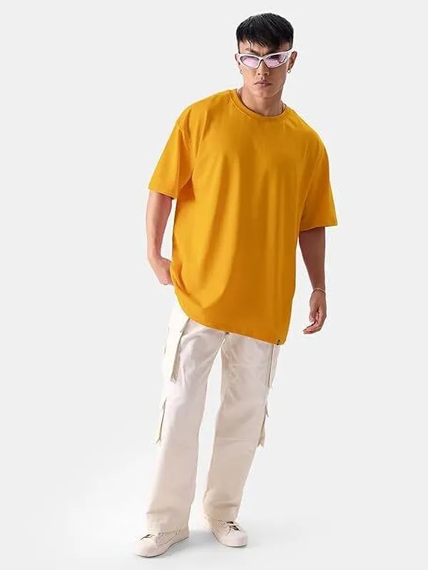 https://d1311wbk6unapo.cloudfront.net/NushopCatalogue/tr:f-webp,w-600,fo-auto/FTS_0309_RN_TSHIRT_MEN_yellow_1720235068658_rv2sy3o3i6uglpb.jpg__Faricon