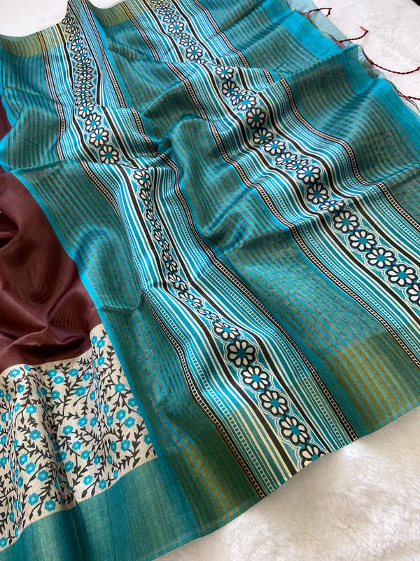 Jivika_Sky_Blue_&_Coffee_Brown_–_Festive_Season_Special_|_Soft_Tussar_Silk_Saree_with_Print,_Border_&_Contrast_Print_Blouse_with_Tassels