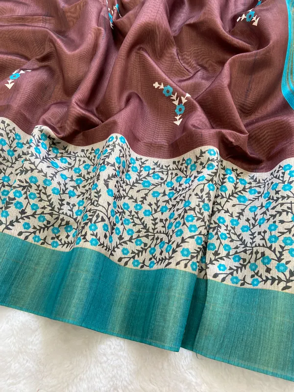 Jivika_Sky_Blue_&_Coffee_Brown_–_Festive_Season_Special_|_Soft_Tussar_Silk_Saree_with_Print,_Border_&_Contrast_Print_Blouse_with_Tassels